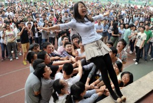 students hoist classmate after completion of Gaokao university entrance examination