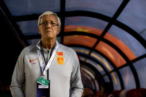 marcello lippi standing at front of pitch tunnel