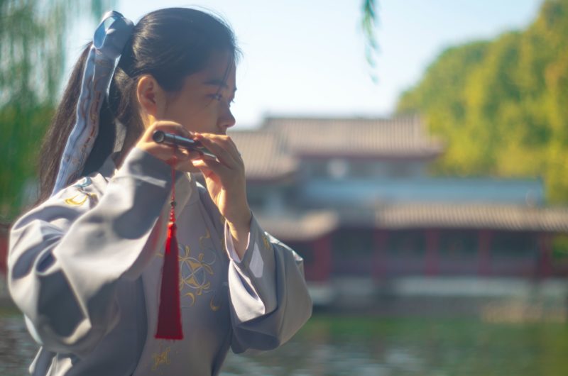 Chengyu Origins: Girl playing the flute