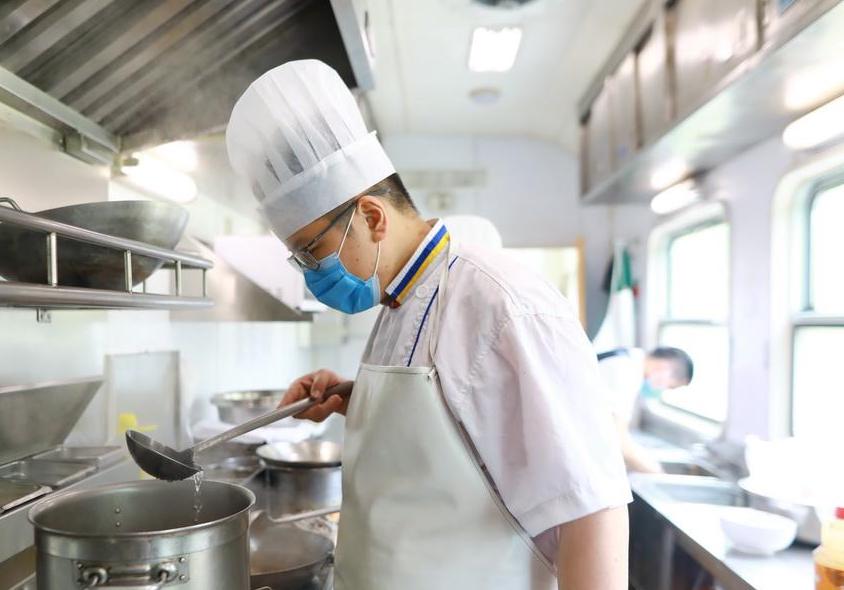 side view of chef preparing food in china